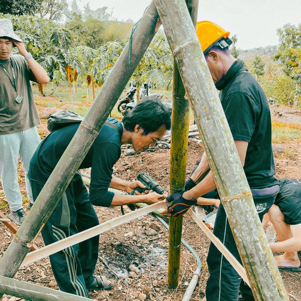Building A-frame levelling during a permaculture workshop in Buleleng Regency of Bali, Indonesia. 2023.